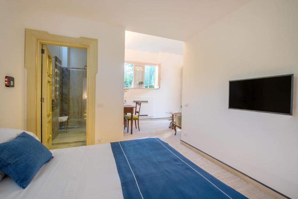 Posteľ alebo postele v izbe v ubytovaní DA Rooms
