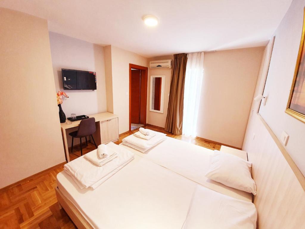 TV a/nebo společenská místnost v ubytování Apartments Pier