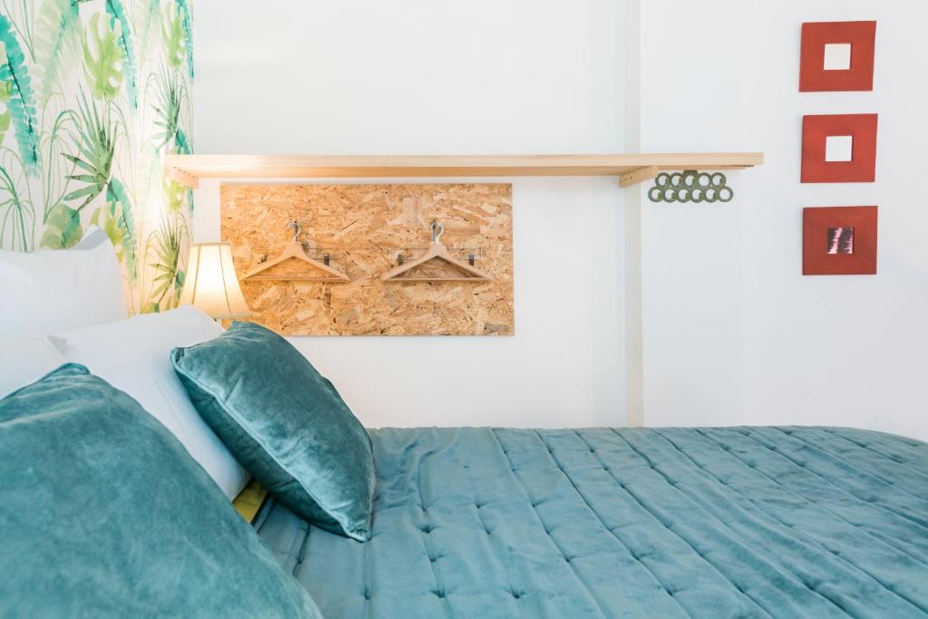 Postel nebo postele na pokoji v ubytování Loft en el corazón de Sevilla
