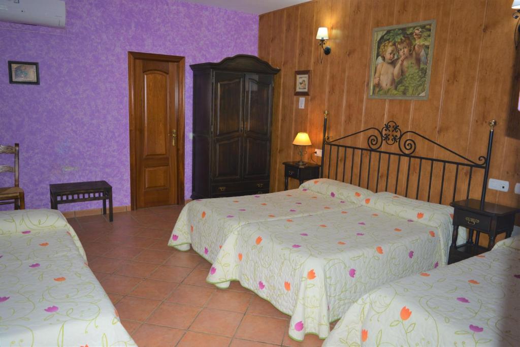 Posteľ alebo postele v izbe v ubytovaní Hospedium Hotel Rural Soterraña