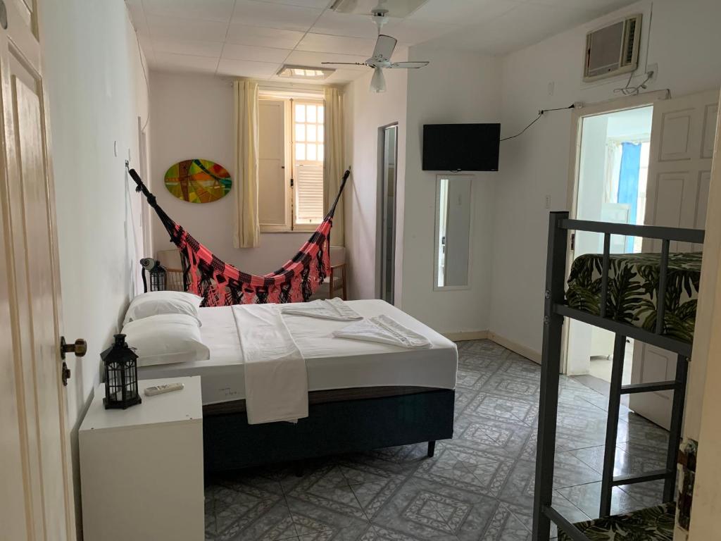 Postel nebo postele na pokoji v ubytování Porto das Palmeiras Hostel