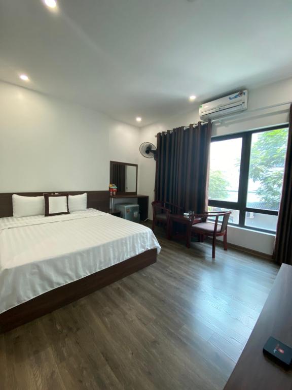 Postel nebo postele na pokoji v ubytování X9 Hotel