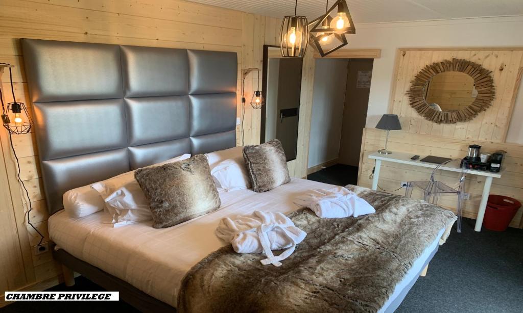 Postel nebo postele na pokoji v ubytování Hotel Le Panorama
