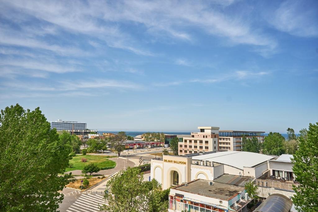 a view of a city with buildings and trees at Hotel Alma Mamaia in Mamaia