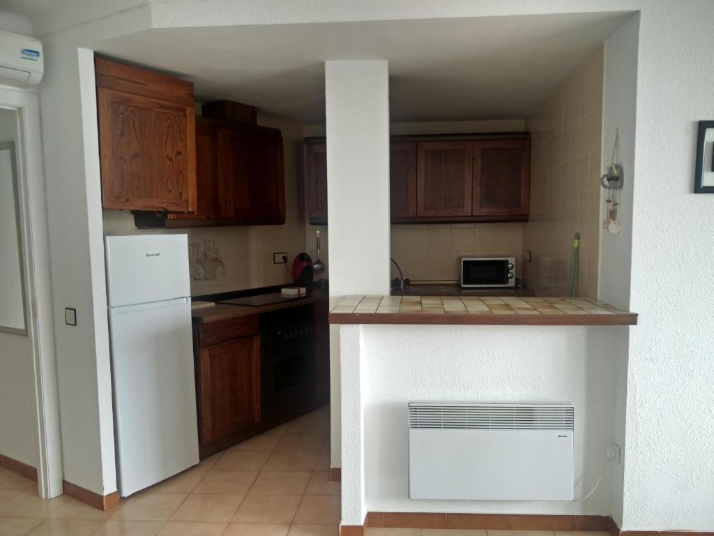 Kuchyňa alebo kuchynka v ubytovaní APARTAMENT AL PORT EmpuriaRent