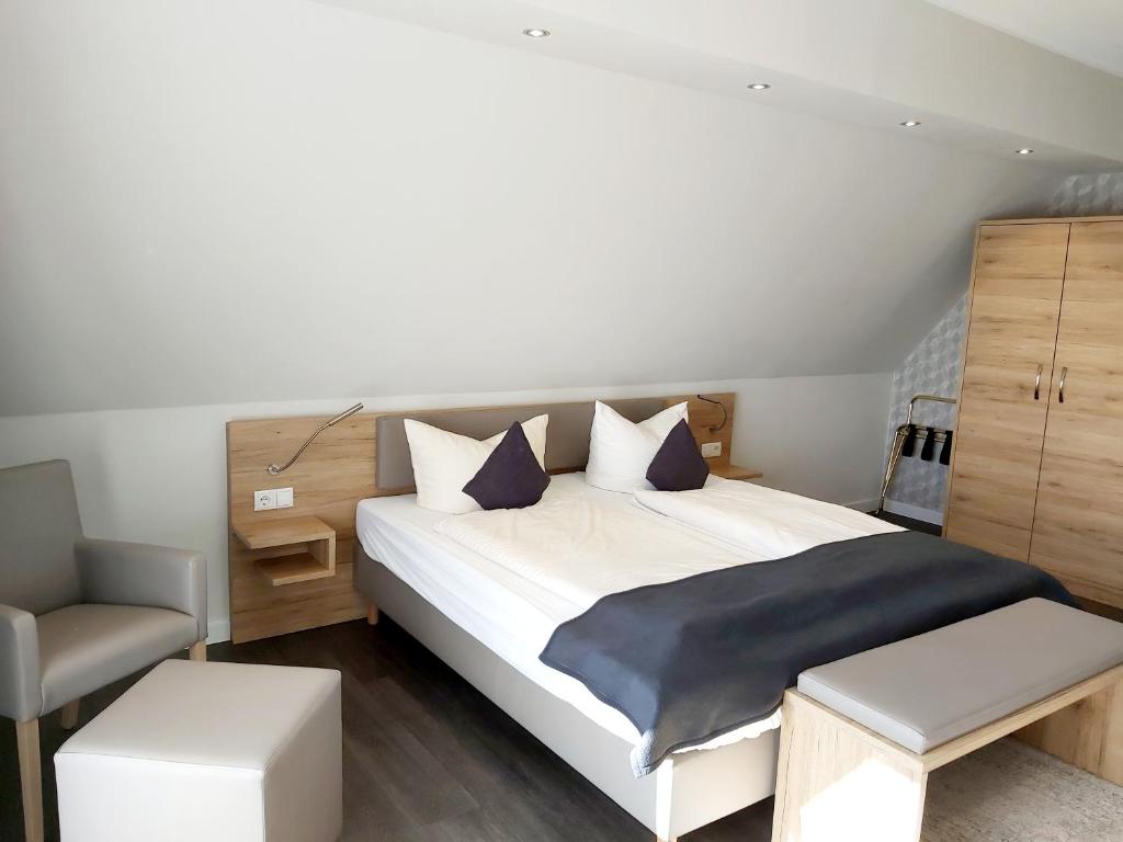 Postel nebo postele na pokoji v ubytování Hotel Pieper-Kersten