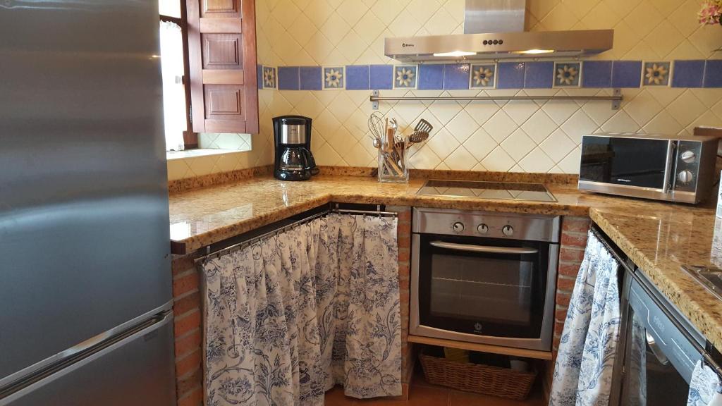 A kitchen or kitchenette at El Juacu
