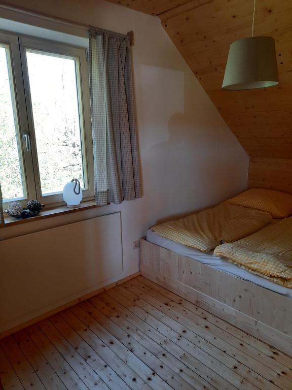 Postel nebo postele na pokoji v ubytování Jagdhaus im Grünen, mit Sauna