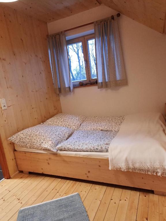 Postel nebo postele na pokoji v ubytování Jagdhaus im Grünen, mit Sauna