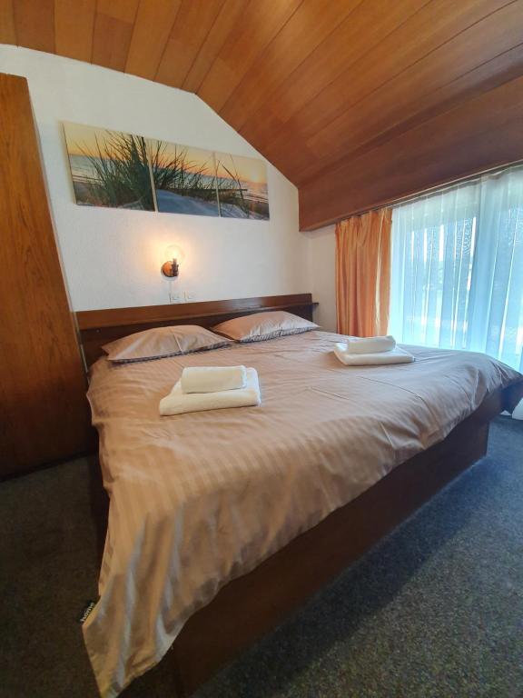 Postel nebo postele na pokoji v ubytování Pri Ancki B&B Ljubljana suburbs