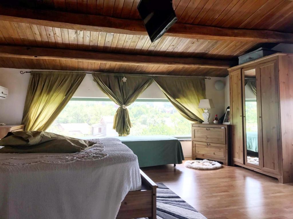 Säng eller sängar i ett rum på Villa paradiso