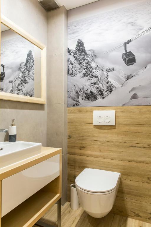 Kúpeľňa v ubytovaní udanypobyt Apartamenty Czorsztyn