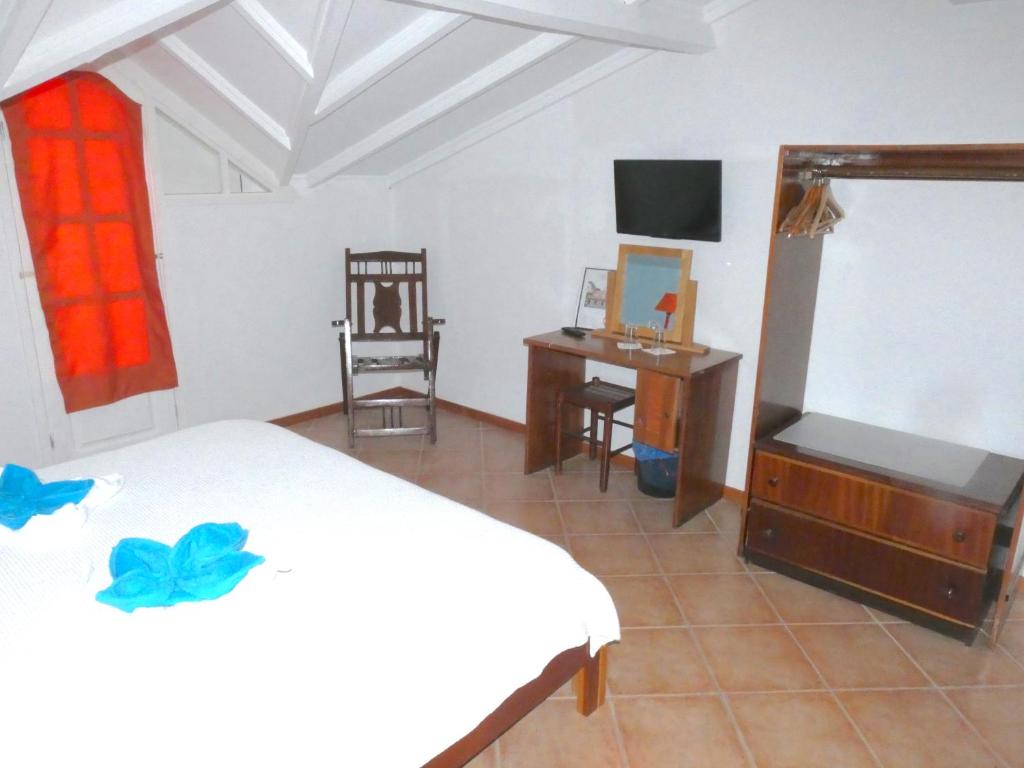 TV a/nebo společenská místnost v ubytování Hotel MiraBela