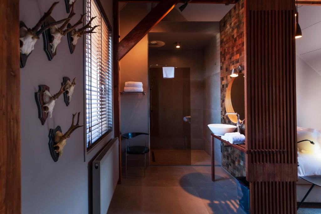 Een bed of bedden in een kamer bij Boutiquehotel Staats
