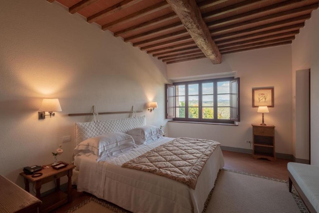 Postel nebo postele na pokoji v ubytování Hotel Le Fontanelle