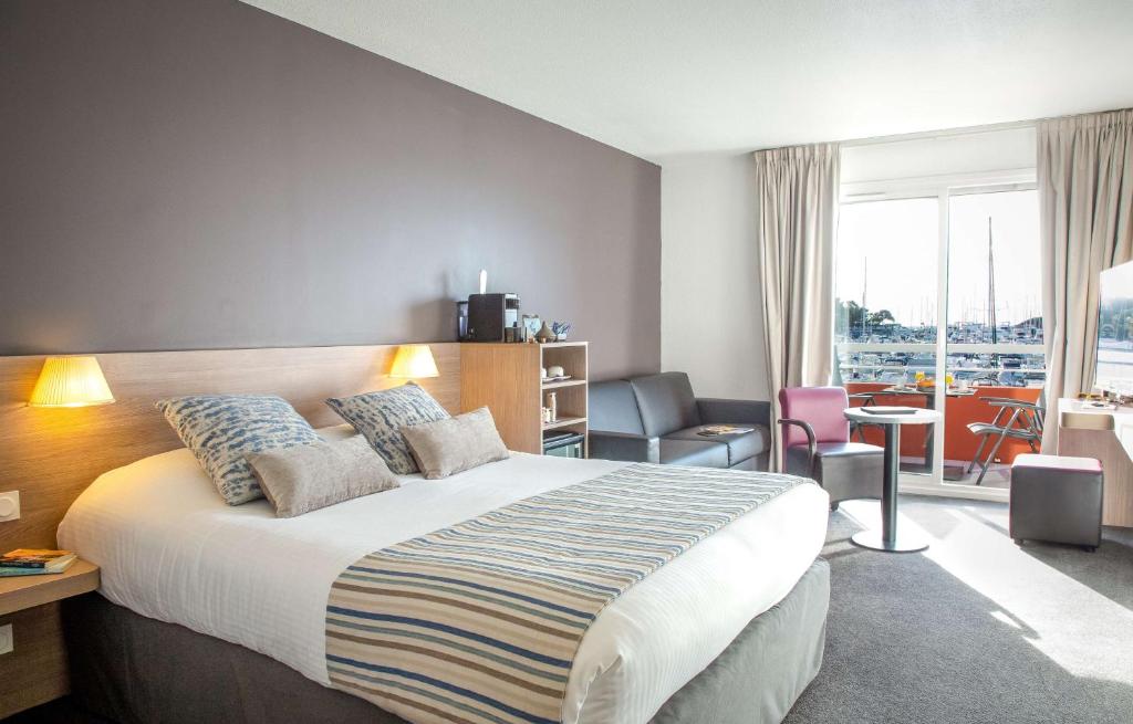 Postel nebo postele na pokoji v ubytování Best Western Plus La Marina