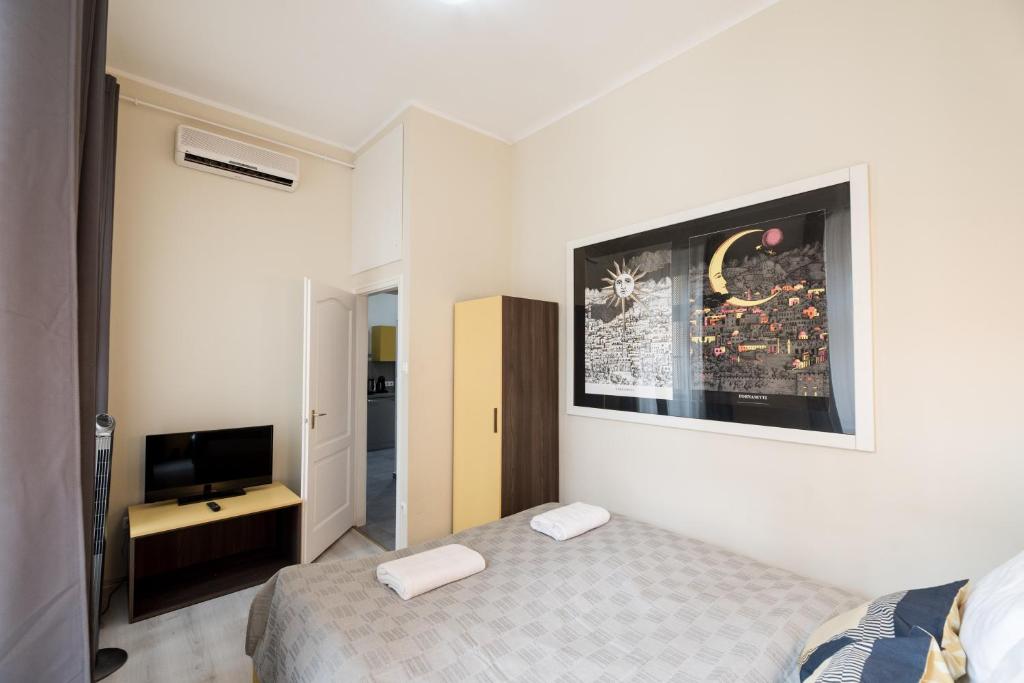 Posteľ alebo postele v izbe v ubytovaní BudapestEasyFlat Oktogon Lux