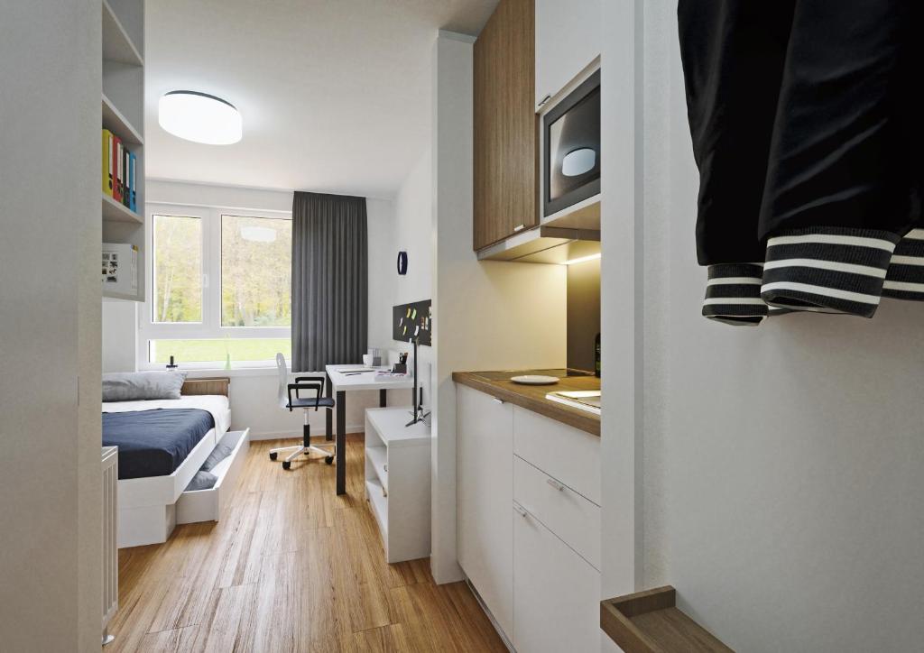 A kitchen or kitchenette at smartments Graz