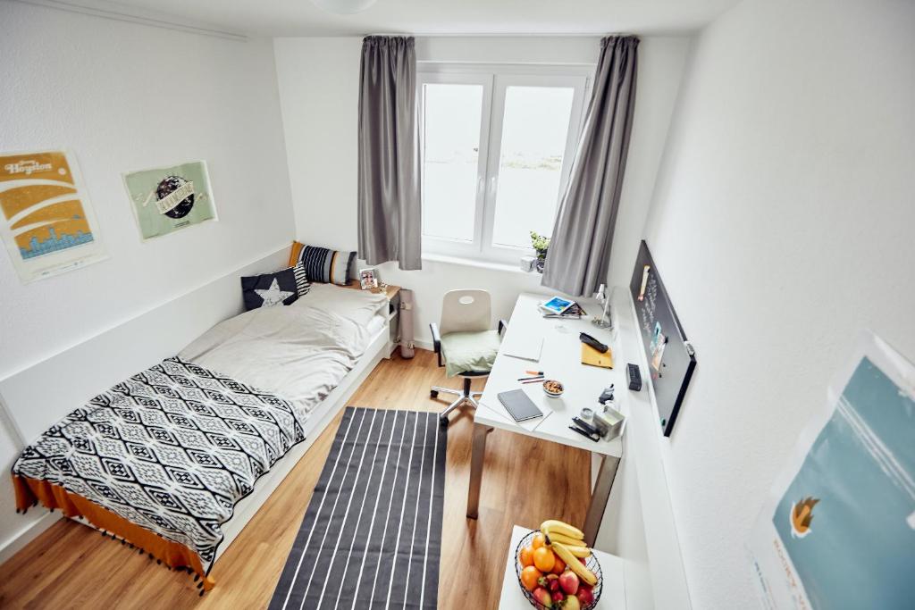 A bed or beds in a room at smartments Graz