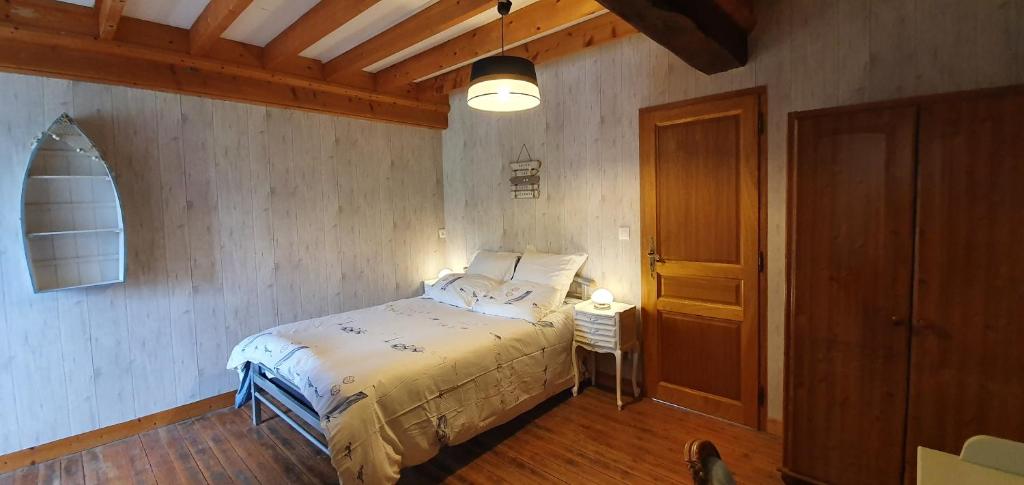 Postel nebo postele na pokoji v ubytování Le Relais de la Comté