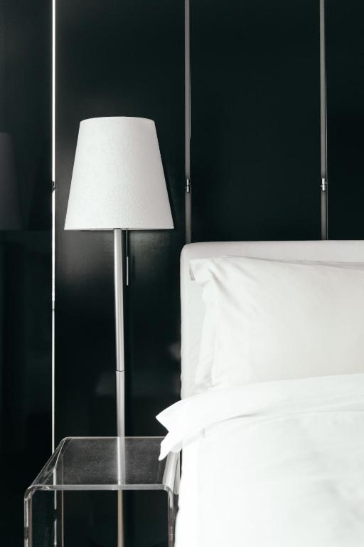 Postel nebo postele na pokoji v ubytování 101 Hotel, a Member of Design Hotels