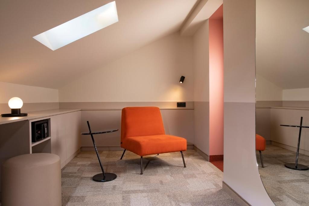 Kuchyň nebo kuchyňský kout v ubytování Hôtel Gutenberg
