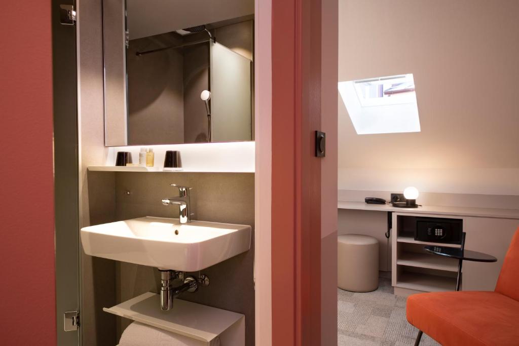 Koupelna v ubytování Hôtel Gutenberg