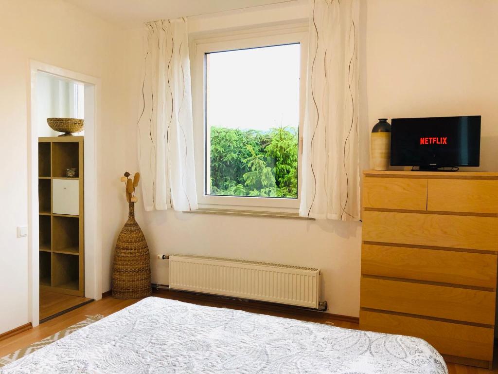 Een bed of bedden in een kamer bij Haus Graf Velden