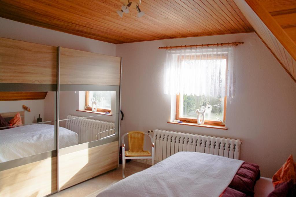 Postel nebo postele na pokoji v ubytování Haus Strandlöper