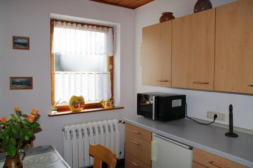 Kuchyň nebo kuchyňský kout v ubytování Haus Strandlöper