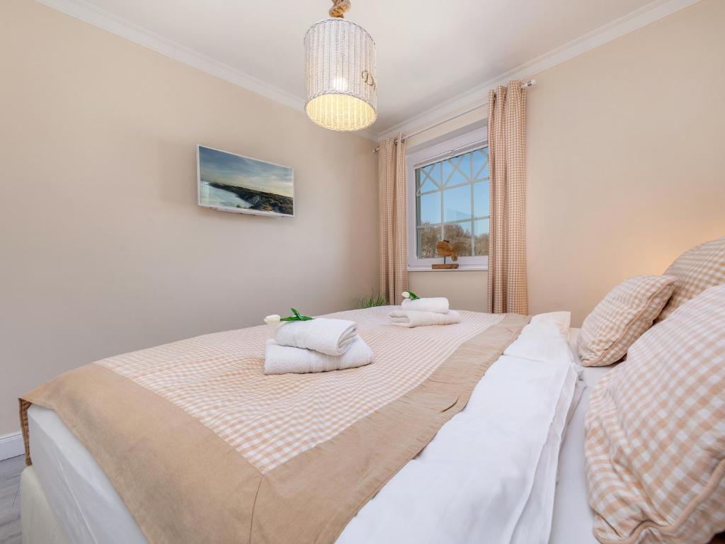 Postel nebo postele na pokoji v ubytování Villa Strandblick