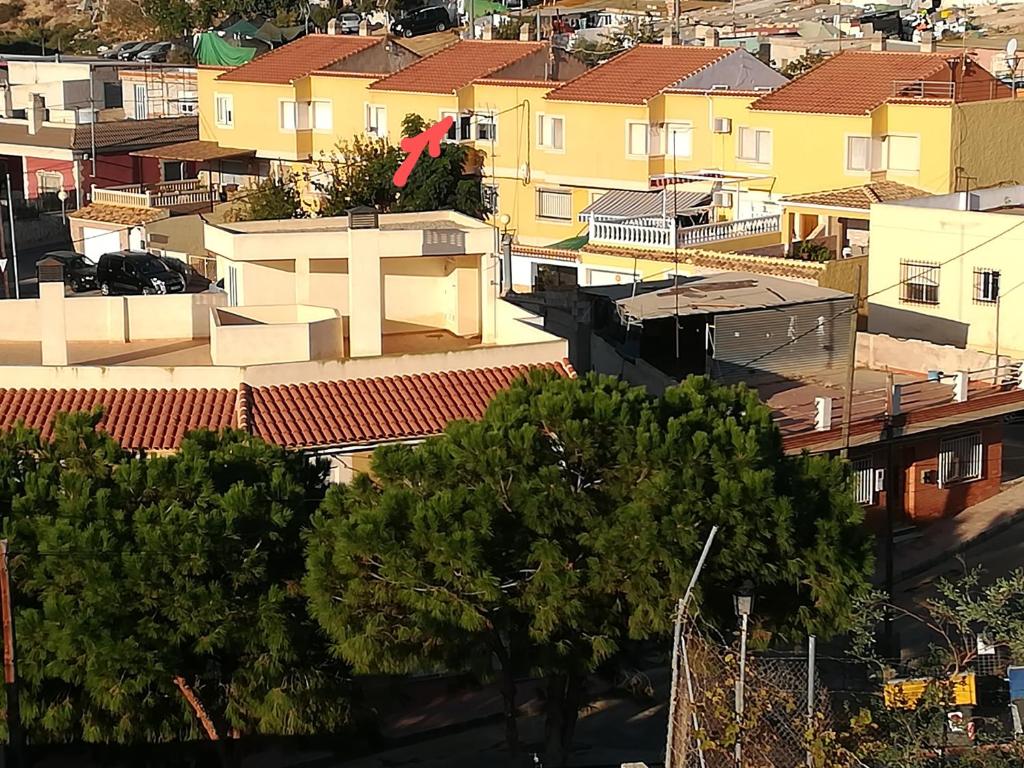 an overhead view of a city with houses and trees at Casa EL CASTILLO,a 5 kilómetros de la playa in Mazarrón