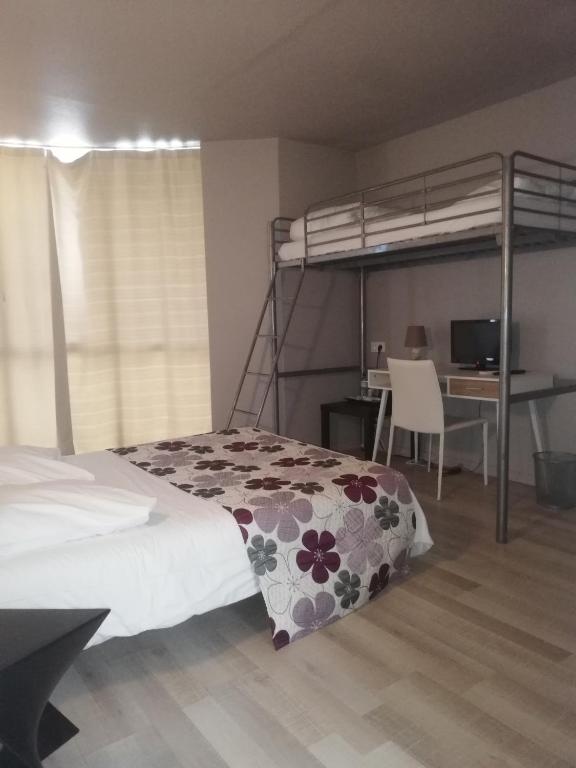Postel nebo postele na pokoji v ubytování Hotel La Clé