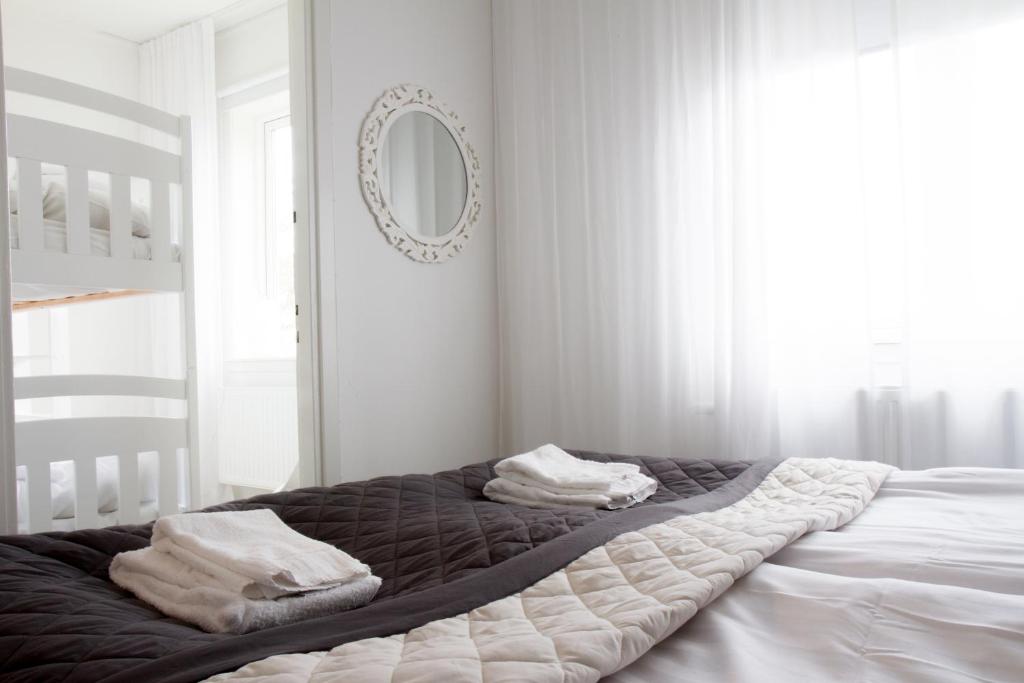 Postel nebo postele na pokoji v ubytování Sjövillan B&B