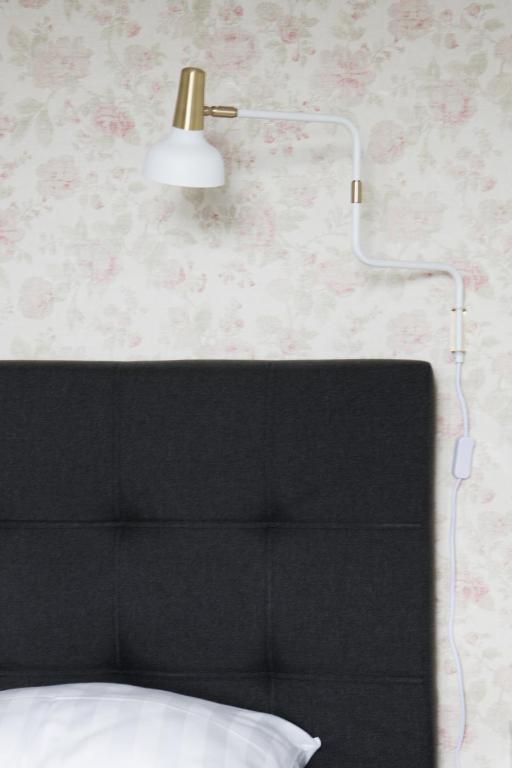 Postel nebo postele na pokoji v ubytování Sjövillan B&B