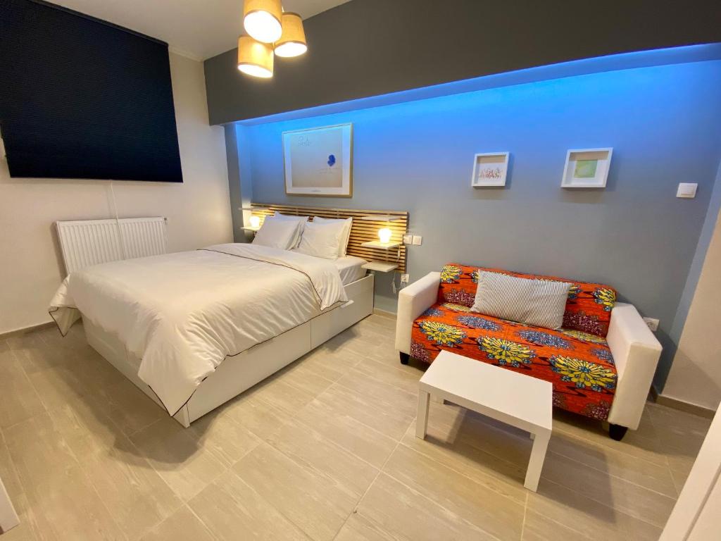 Posteľ alebo postele v izbe v ubytovaní For a genuine Athenian homestay!