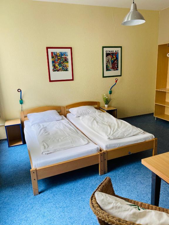 Postel nebo postele na pokoji v ubytování Happy Hotel Berlin