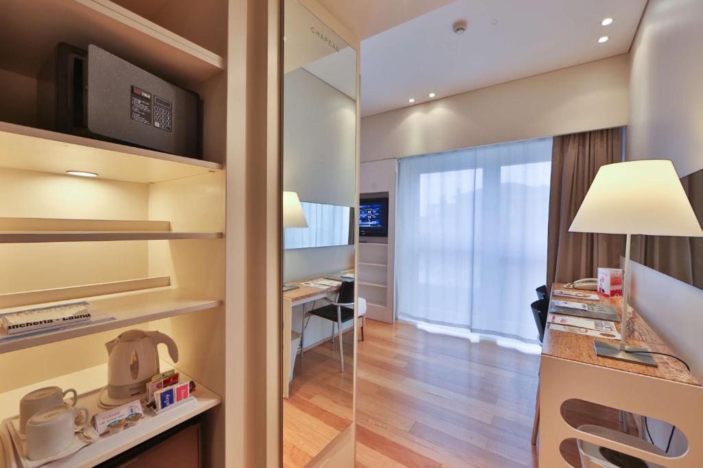 Kuchyň nebo kuchyňský kout v ubytování Best Western Plus Hotel Bologna