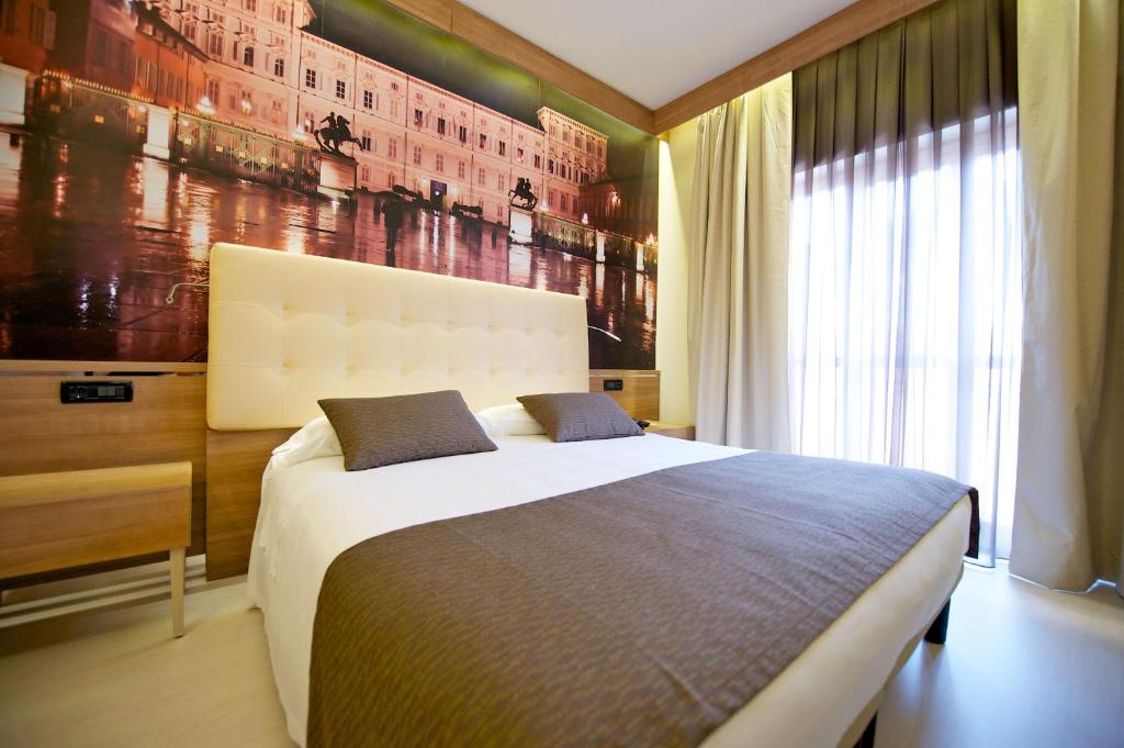 Postel nebo postele na pokoji v ubytování Best Western Hotel Luxor