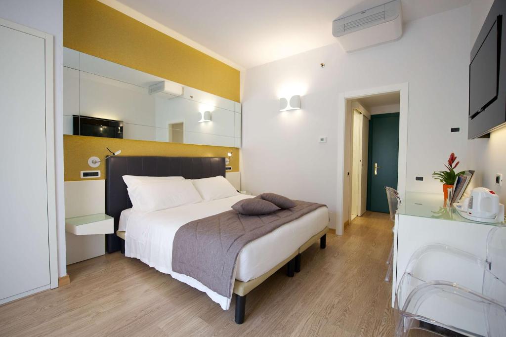 Postel nebo postele na pokoji v ubytování Best Western Hotel Luxor
