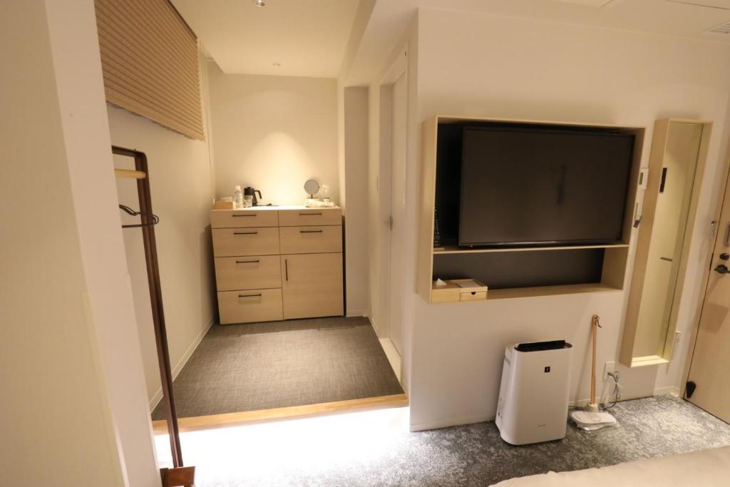 TV a/nebo společenská místnost v ubytování GEN HOTEL KAMAKURA
