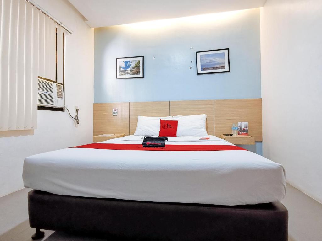 Postel nebo postele na pokoji v ubytování RedDoorz near Trade School Gensan
