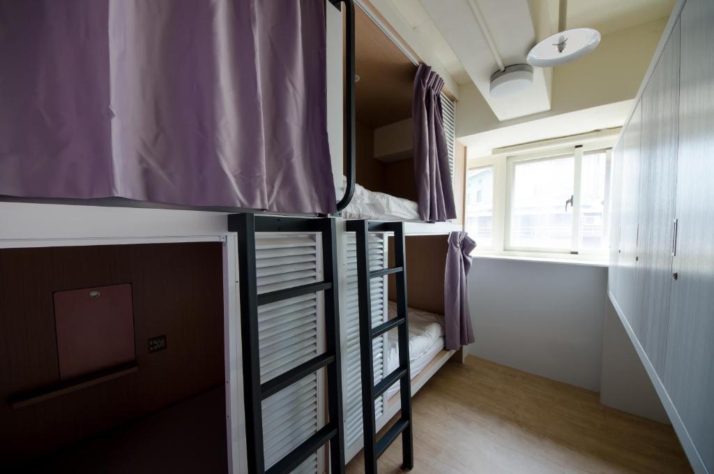 Postel nebo postele na pokoji v ubytování Loosha Hostel