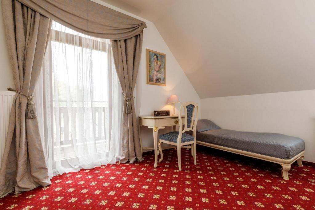 Letto o letti in una camera di Farma Hory