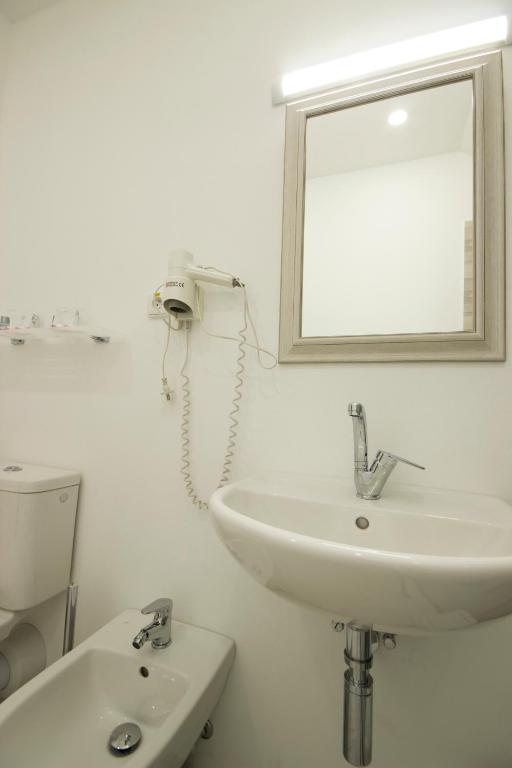 Koupelna v ubytování Hotel Maroli Mikulov