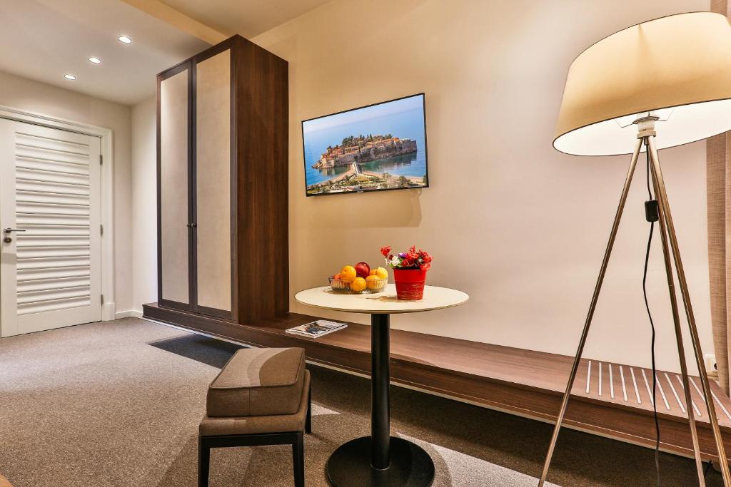 Gulta vai gultas numurā naktsmītnē Hotel Bono