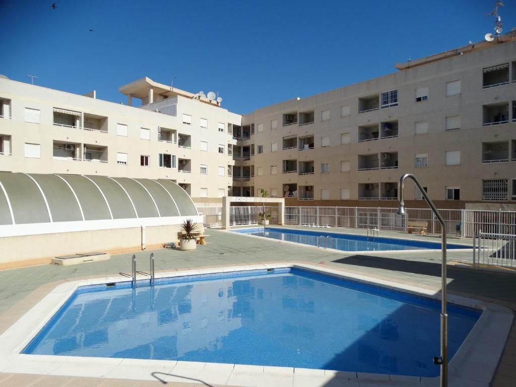 Bazén v ubytovaní Apartamento Laguna Rosa alebo v jeho blízkosti