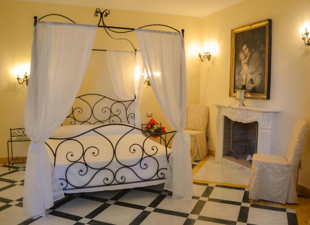 Postel nebo postele na pokoji v ubytování Relais La Rupe