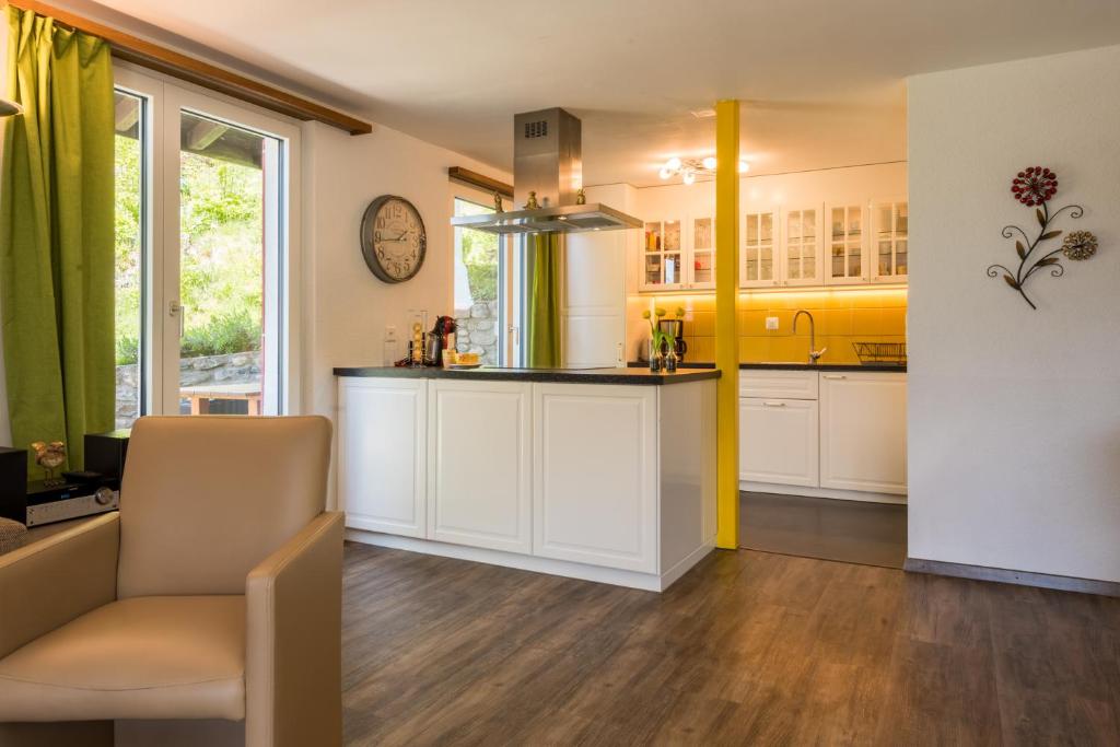 Kuchyň nebo kuchyňský kout v ubytování Chalet Ravenstein