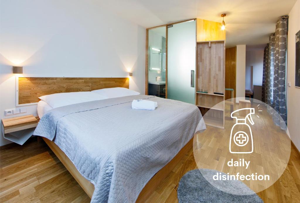Postel nebo postele na pokoji v ubytování Hotel Wolf
